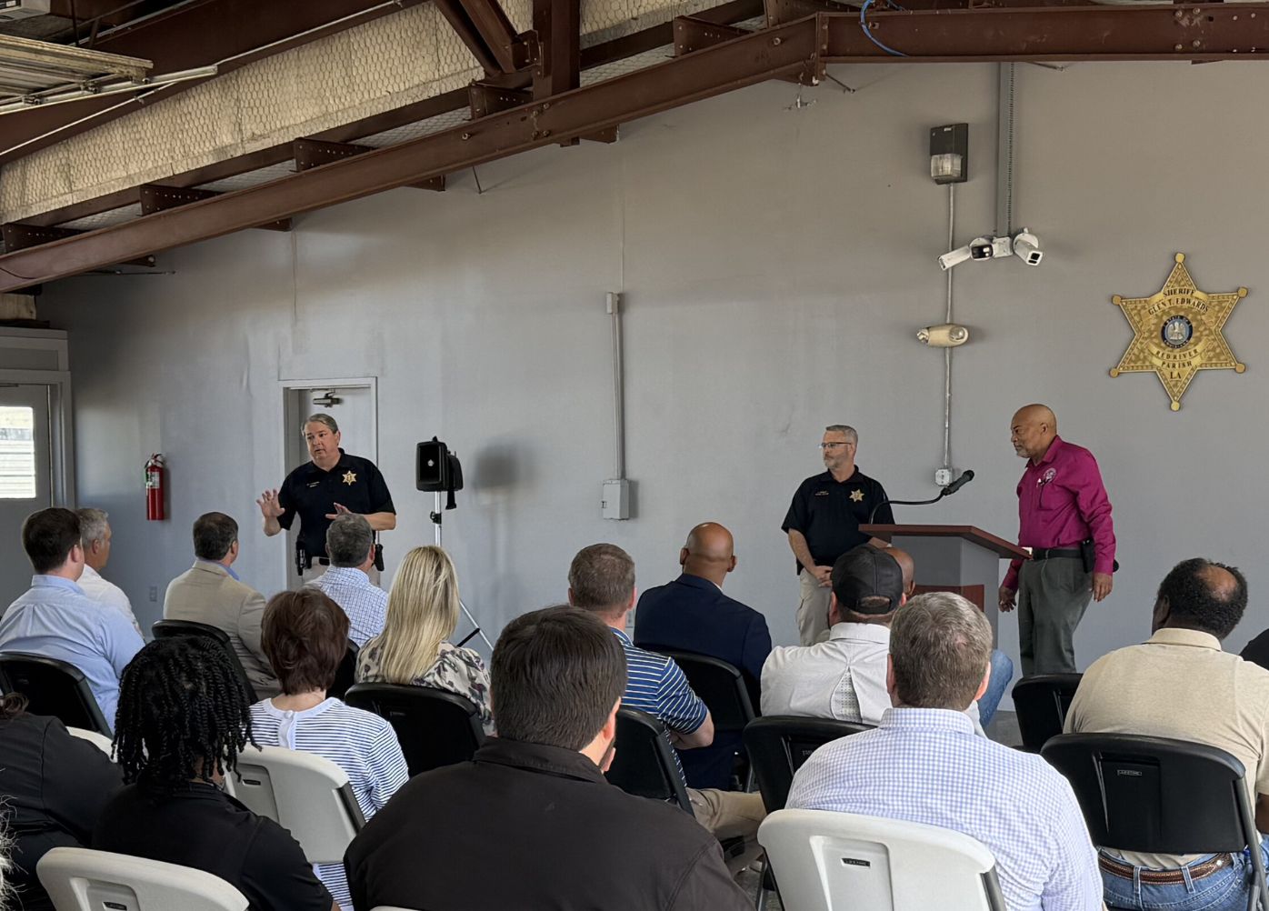 Sheriff Glen Edwards, Captain James Moseley and Police Jury Administrator Jessie Davis discussing the project at the groundbreaking ceremony